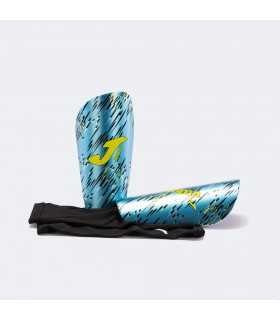 JOMA ESPINILLERAS SPIDER TURQUESA FLÚOR