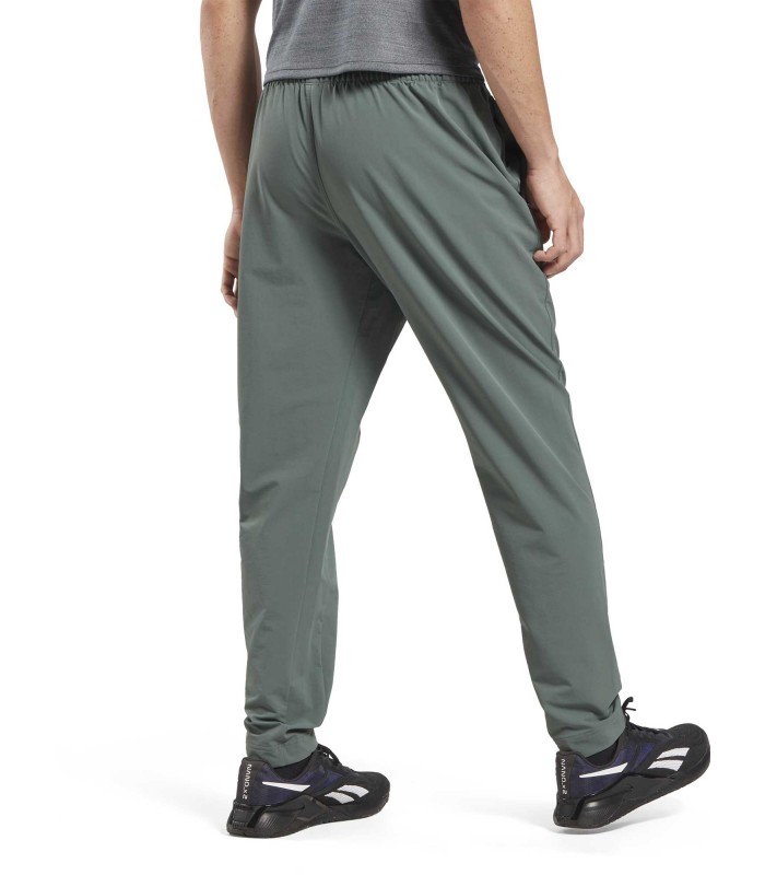 REEBOK Pantalones tejidos de alto rendimiento